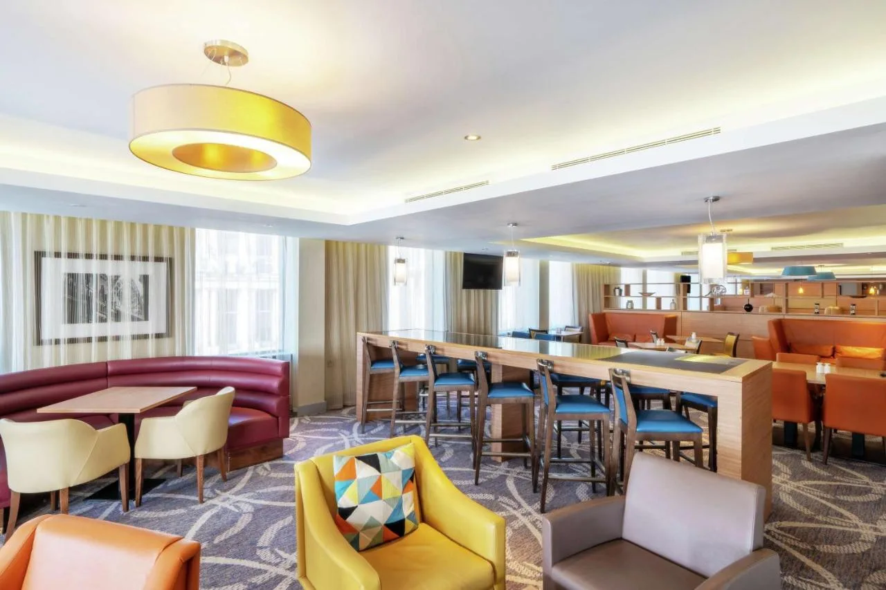 Restaurant and bar seating at Hampton by Hilton Newcastle on Neville Street